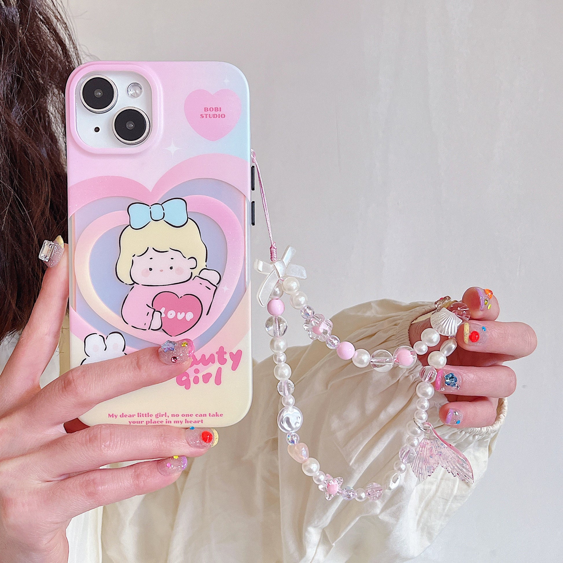 Discover the ocean-inspired Mermaid Beaded Pearl Phone Charm in 4 vibrant colors – a secure, stylish, and versatile Y2K accessory perfect for tech lovers and beach enthusiasts alike!